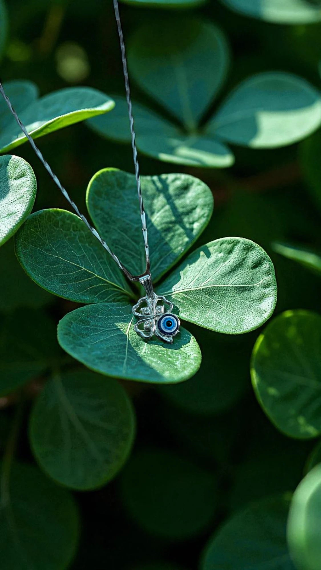 Silver Four-Leaf Clover Evil Eye Necklace
